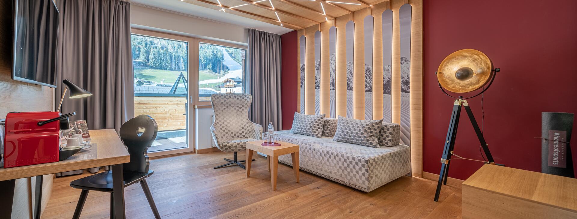 large hotel room with mountain view