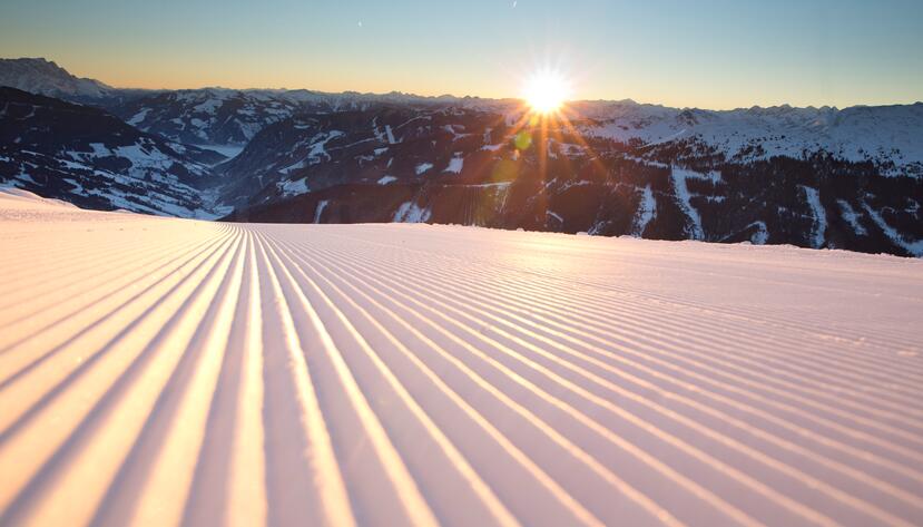 ski slope at sunset